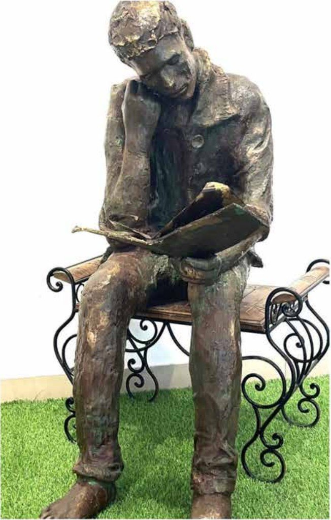 Seema Dua Reader in the Park . (Figure) 18×18×48 in. (Bench)